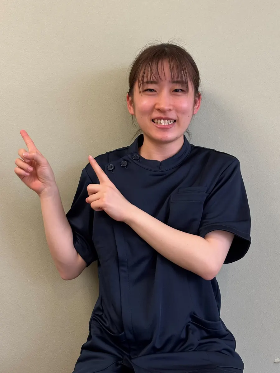 ご相談をご案内する女性スタッフ